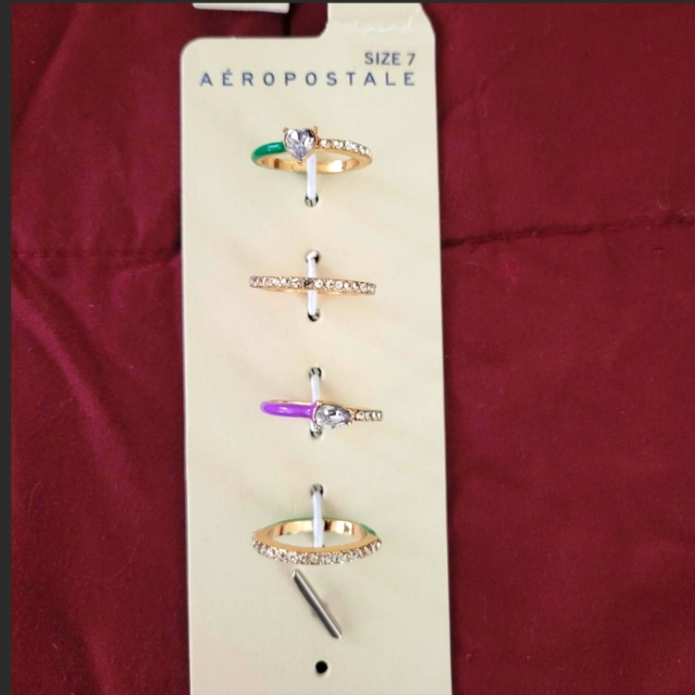 A set of Aeropostale rings, never used